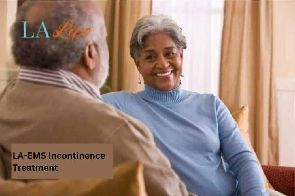 Couple sat smiling at each other - LA-EMS treatment Sands End