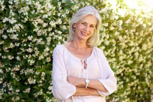 Older woman happy with urinary incontinence treatment Sands End