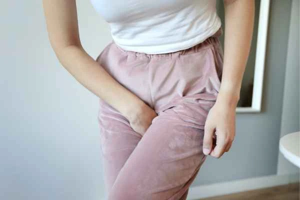 woman running for the toilet because of urinary incontinence Sands End